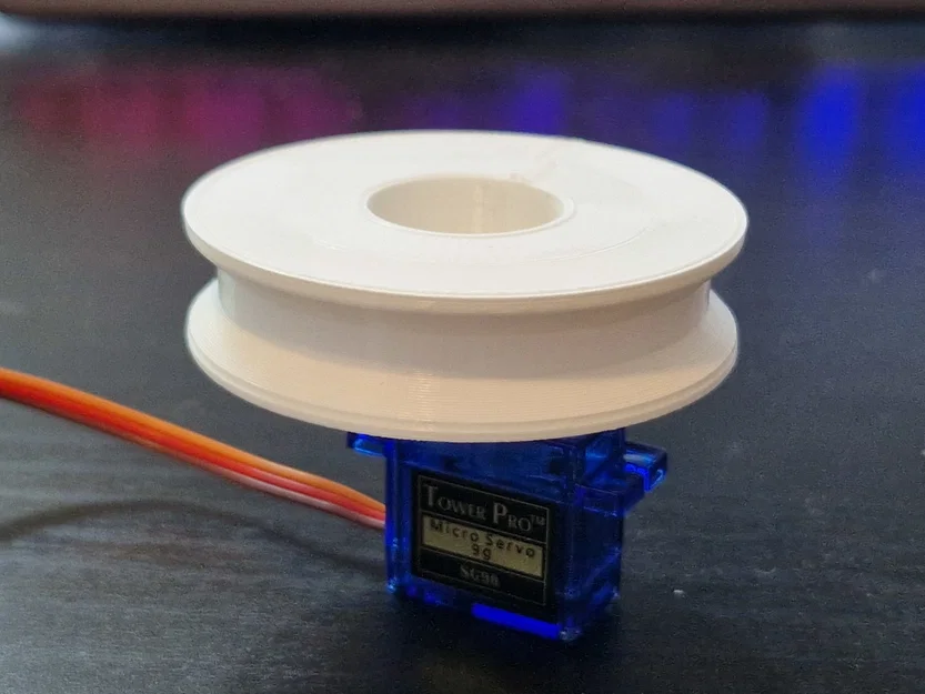 Phụ kiện gắn bánh xe/puly cho Servo - Image 1