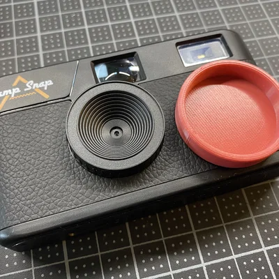 Nắp đậy ống kính 3D cho máy ảnh Camp Snap đơn giản và tiện lợi