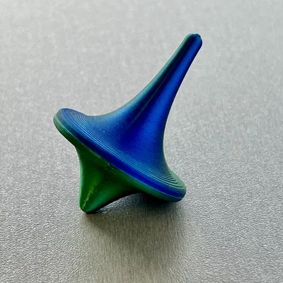 Con Quay Spinning Top