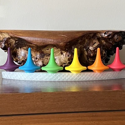 Con Quay Spinning Top