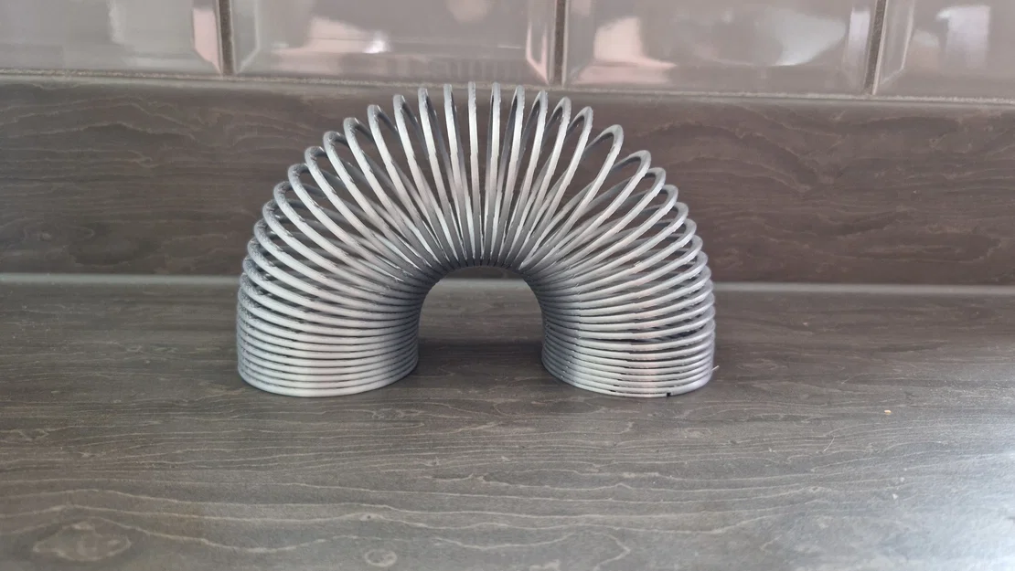 Ống Trụ Lò Xo Slinky (Slinky Spring Cylinder) - Image 1