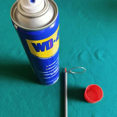 Giá giữ cannula cho lon dầu bôi trơn dạng xịt