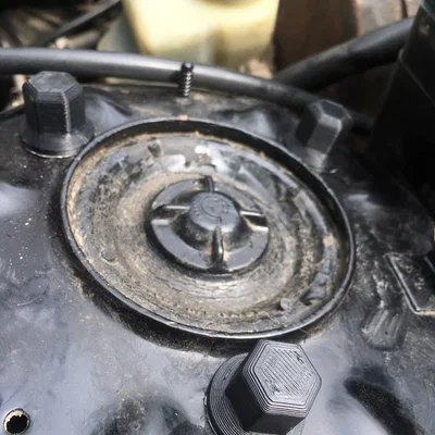 BMW E30 - Nắp chụp ốc chốt phuộc trước (front strut pin nut cap)