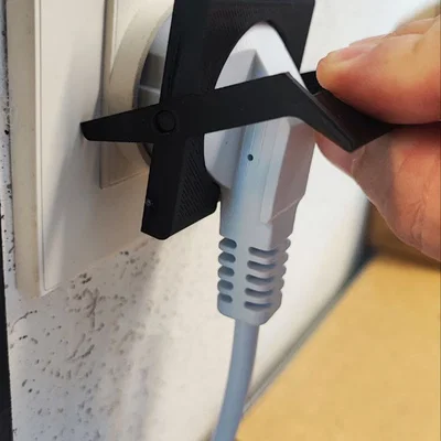Dụng cụ hỗ trợ rút phích cắm điện an toàn (Débranche prise murale)