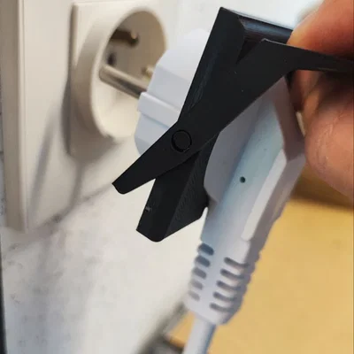 Dụng cụ hỗ trợ rút phích cắm điện an toàn (Débranche prise murale)