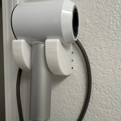 Giá treo máy sấy tóc Dyson gắn tường kèm quản lý dây điện tiện lợi