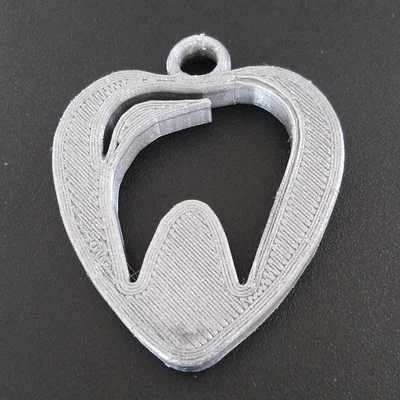Móc khóa hình trái tim kết hợp răng 3D độc đáo cho nha sĩ