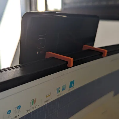 Giá đỡ điện thoại kẹp trên màn hình dạng Parametric (Webcam)