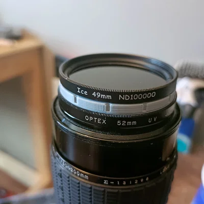 Adapter filter 49mm sang 52mm cho lens (Lens filter adapter 49mm to 52mm)