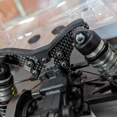 Miếng bảo vệ rear shock tower cho XRAY XB2 2024