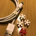 Kẹp Cố Định Dây Cáp Hình Bông Tuyết Tiện Lợi Cho Người Hay Di Chuyển - Thumbnail 1