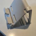 Giá đỡ điện thoại 3D gấp gọn, có khe cắm sạc tiện lợi - Thumbnail 1
