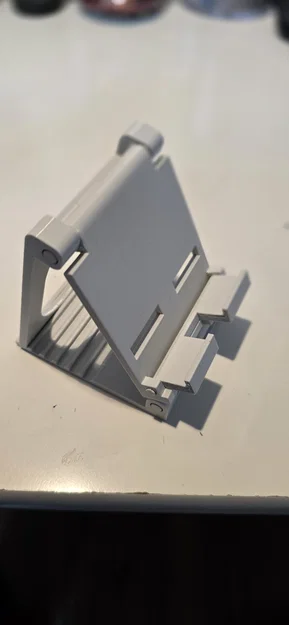 Giá đỡ điện thoại 3D gấp gọn, có khe cắm sạc tiện lợi - Image 2