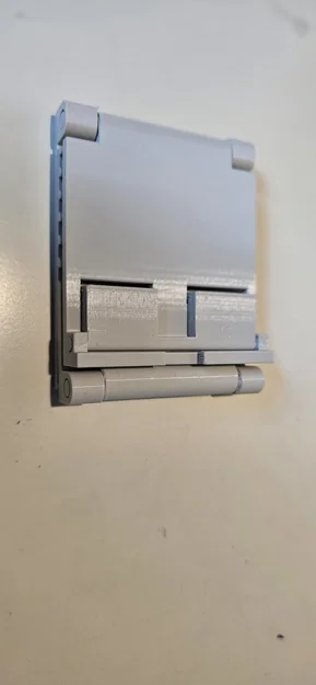 Giá đỡ điện thoại 3D gấp gọn, có khe cắm sạc tiện lợi - Image 3