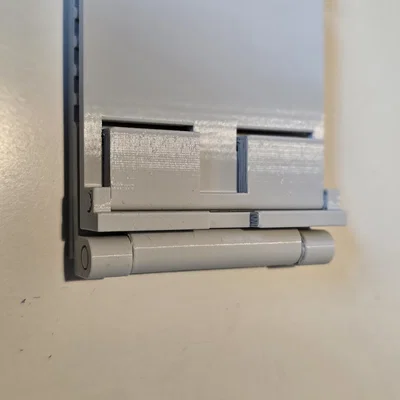 Giá đỡ điện thoại 3D gấp gọn, có khe cắm sạc tiện lợi