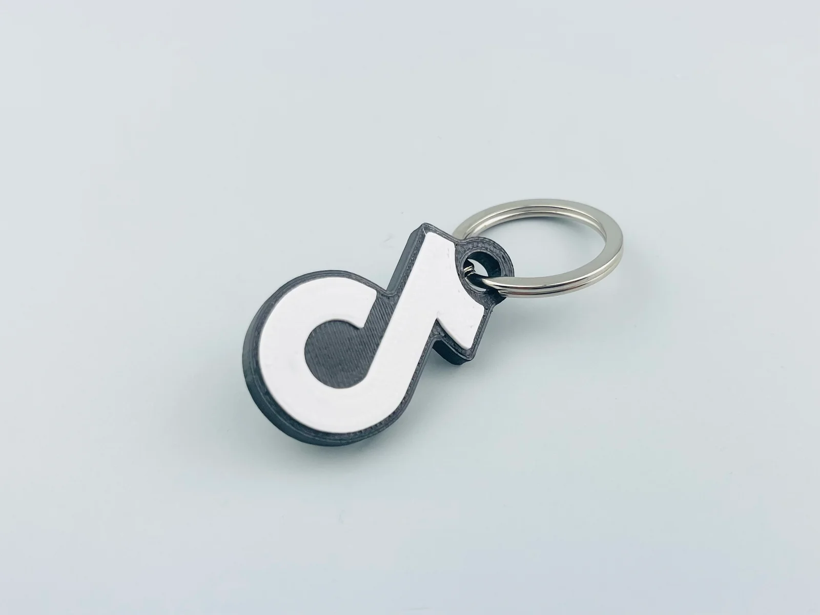 Móc khóa logo TikTok in 3D - Phụ kiện cá tính cho tín đồ sá… 1
