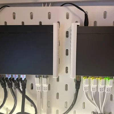 Ngàm gắn switch TP-Link TL-SG105 lên bảng treo IKEA Skådis