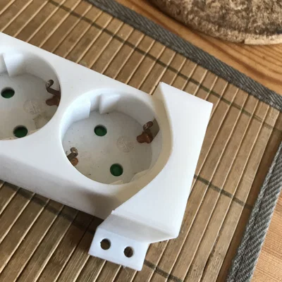 Giá đỡ ổ cắm điện (Power strip holder)