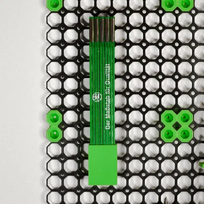 Giá treo thước gấp cho hệ thống Multiboard tiện lợi