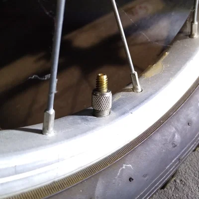 Adapter van Dunlop/Presta sang Schrader