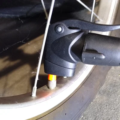 Adapter van Dunlop/Presta sang Schrader