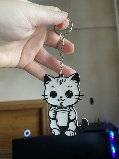 Móc khóa mèo dễ thương ôm ly cà phê - Image 1