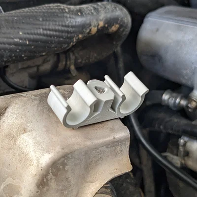Giá đỡ bình nước phụ BMW / Land Rover Discovery 2 TD5 (17111719190)