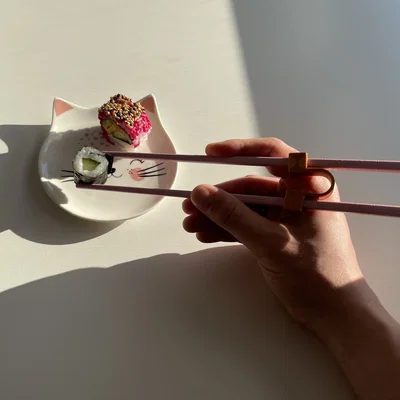 Chopstick Helper – Dụng cụ hỗ trợ cầm đũa
