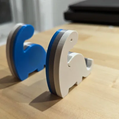 Giá đỡ điện thoại, máy tính bảng hình khủng long in 3D dễ thương