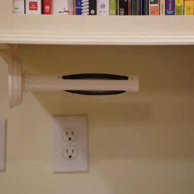 Giá đỡ giấy cuộn có cơ chế bánh cóc (Ratcheting paper towel holder)