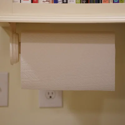 Giá đỡ giấy cuộn có cơ chế bánh cóc (Ratcheting paper towel holder)