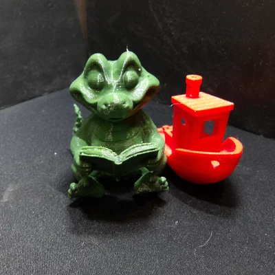 Mô hình chú cá sấu 3D đang đọc sách cực đáng yêu