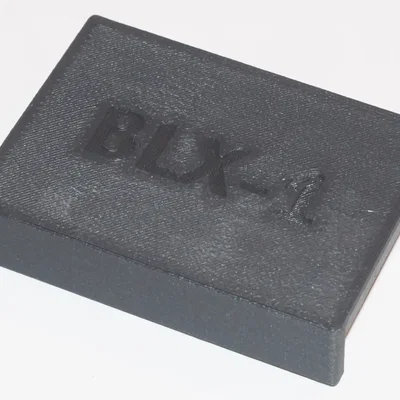 Nắp che pin cho Olympus / OM System BLX-1