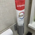 Giá treo kem đánh răng dán tường (Toothpaste Wall Holder) - Thumbnail 1