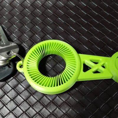 Dụng cụ mở nắp chai PET - Spinner Fidget (móc khóa)