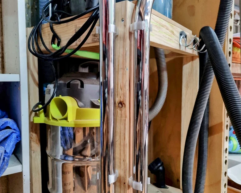 Kẹp treo ống hút bụi Ryobi 20L - Giải pháp lưu trữ gọn gàng cho xưởng - Image 1