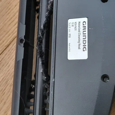 Ngàm kẹp chổi thay thế cho máy hút bụi Grundig VCH 9631