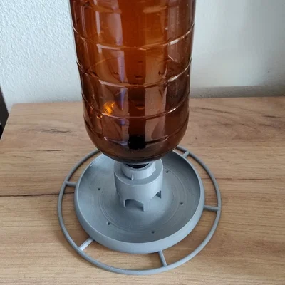 Bộ điều hợp (Reduction) in 3D cho khay ăn chim từ chai nhựa