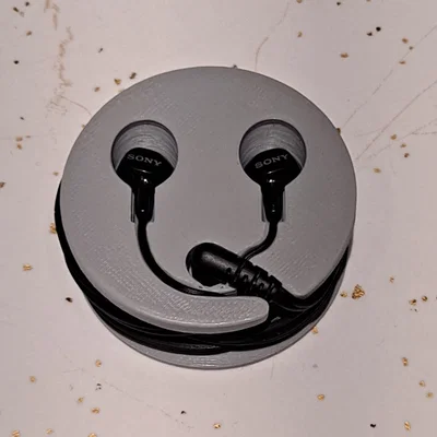 Puck quấn dây tai nghe (Headphone puck)