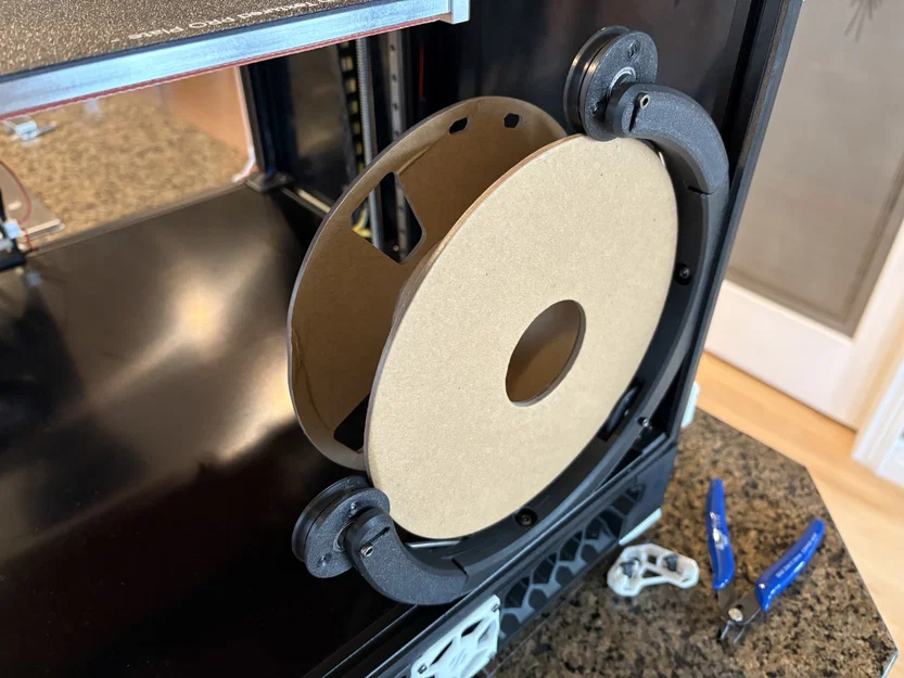 Giá đỡ cuộn bên trong lò xo (Spring Loaded Internal Spool Holder) - Image 1