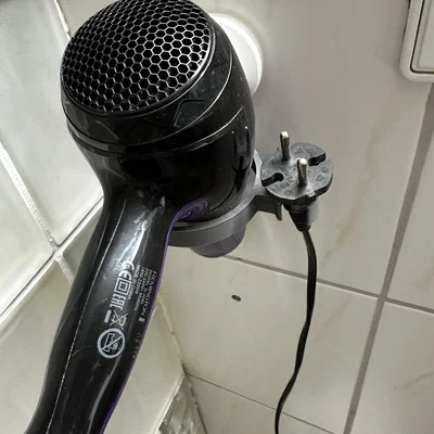Ikea Tisken - Ngàm treo máy sấy (bản cập nhật mới) kèm móc treo dây/phích cắm