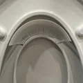 Tấm chắn tia nước cho bé tập bô (Potty Training Pee Guard) - Thumbnail 1