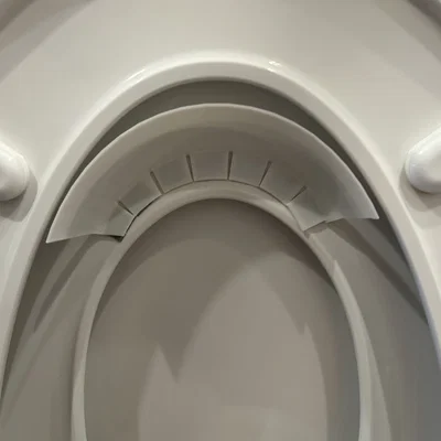 Tấm chắn tia nước cho bé tập bô (Potty Training Pee Guard)