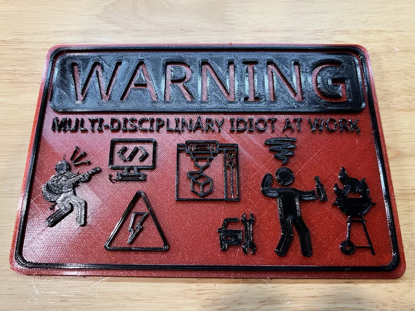 Bảng cảnh báo: Idiot đa ngành đang làm việc (Multi-Disciplinary Idiot at Work) - Image 1
