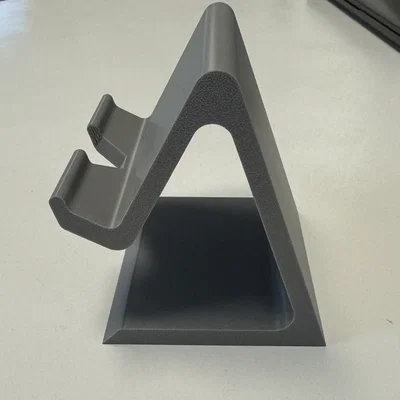 Giá đỡ điện thoại 3D để bàn thiết kế thông minh, có khe luồn dây sạc