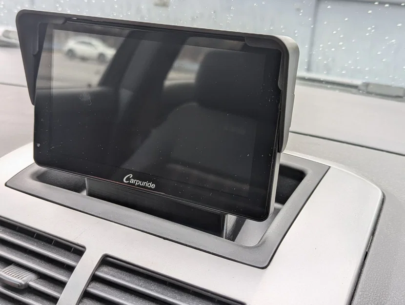 Giá nâng gắn Carpuride W701 cho khay taplo VW Polo 9N3 - Image 1