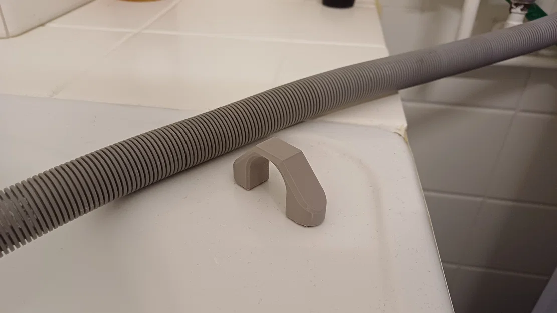 Kẹp giữ ống xả máy giặt (nam châm) – Washing machine drain hose holder - Image 2