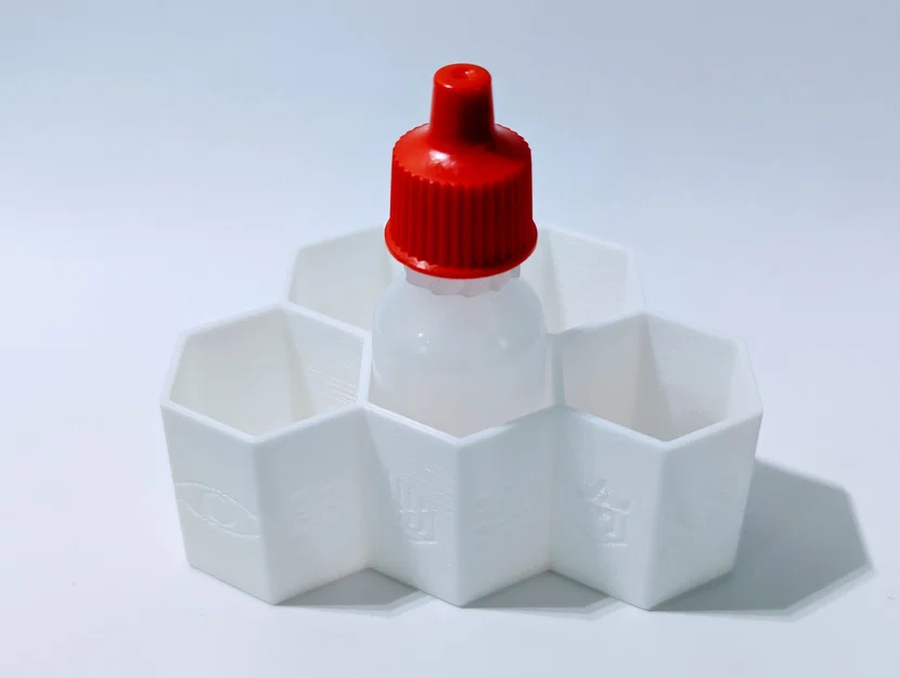 Khúc xạ nhãn khoa: Giá đỡ thuốc nhỏ mắt tổ ong Honeycomb - Image 1