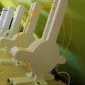 Bộ wheel buffer MMU2 kín hoàn toàn, có lỗ bắt vít & clamp PTFE - Thumbnail 1