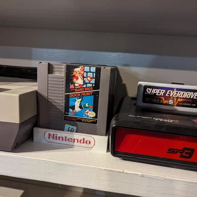 Kệ trưng bày và sắp xếp băng game Nintendo NES in 3D